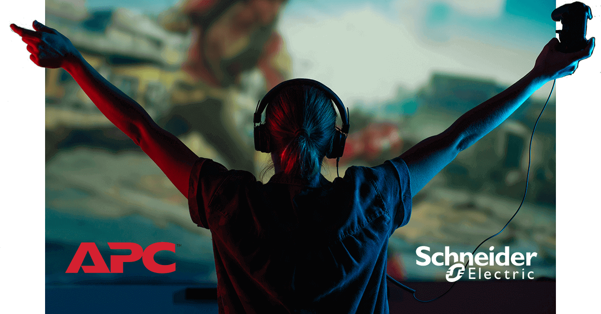 APC Logo / Schneider Electric Logo - image of female gamer from the back celebrating with arms outstretched and a joypad in her hand. Highlighted in red and blue lighting' - header image